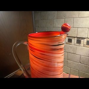Hand blown glass pitcher